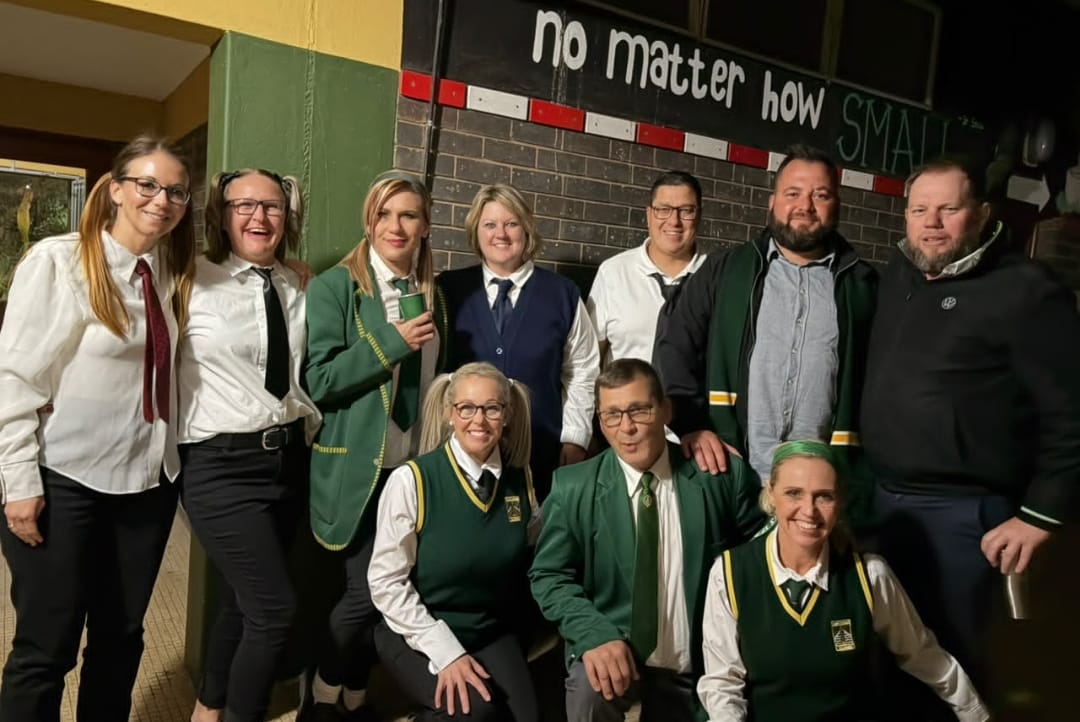 Guests in school-uniform costumes at a South African school fundraiser trivia dance evening
